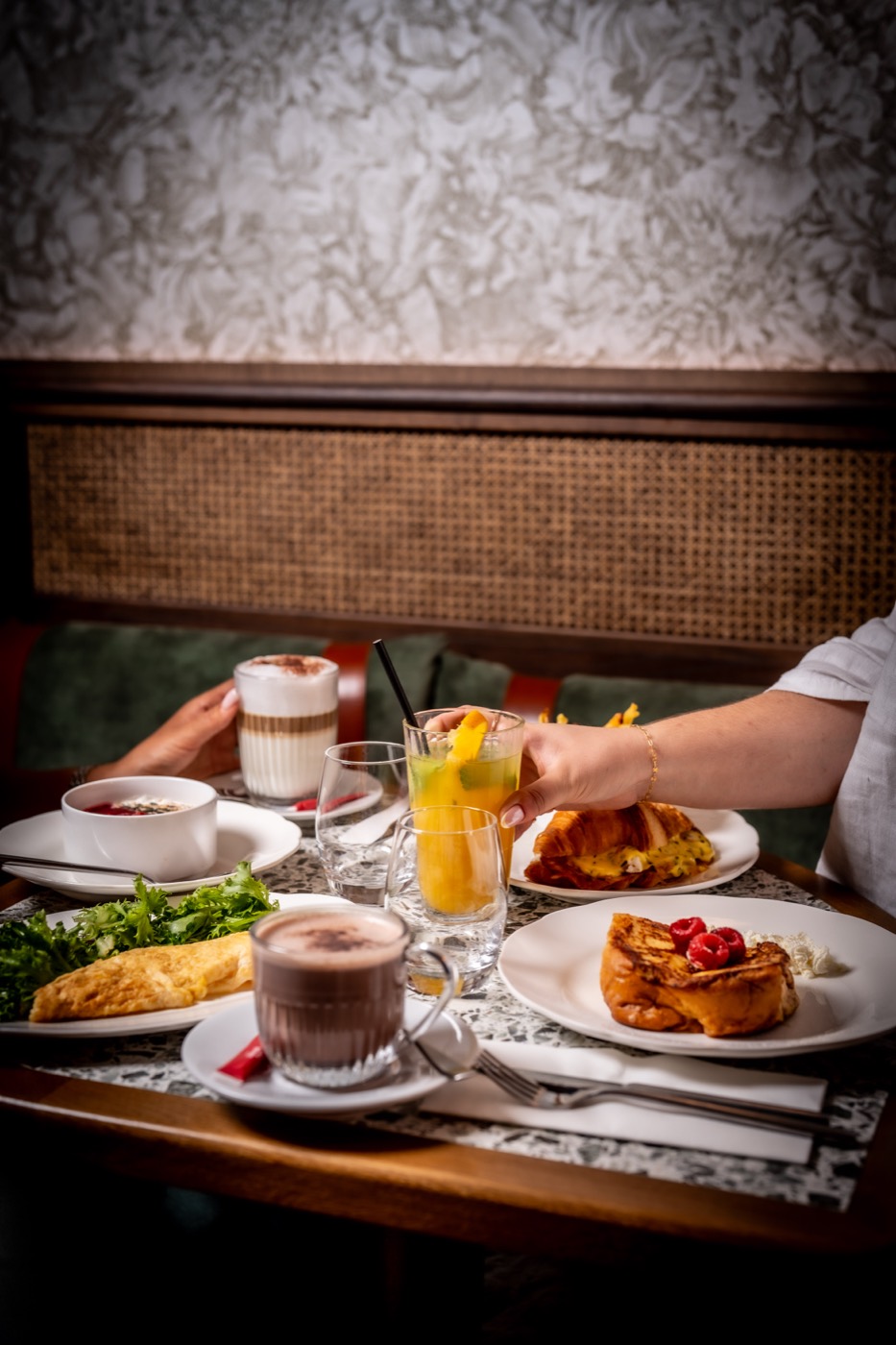 A brunch plate, eggs and coffee
