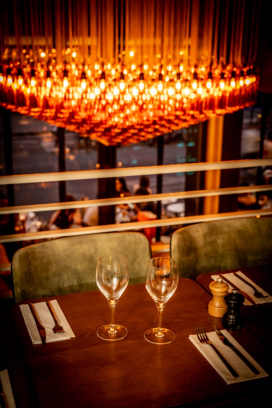 Red chandelier hanging above the Velvet Club